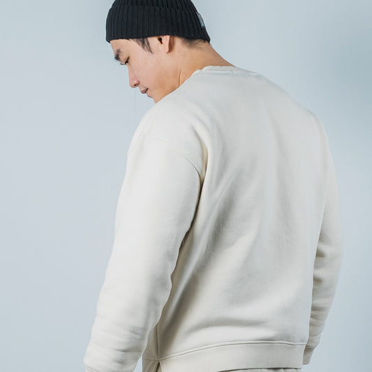 Sweatshirt mit Gummipatch in der Farbe creme