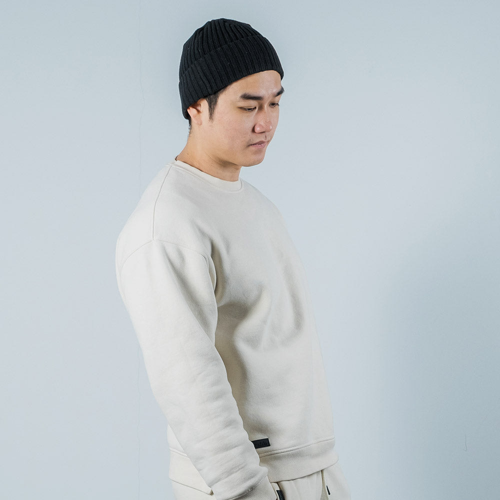 Sweatshirt mit Gummipatch in der Farbe creme